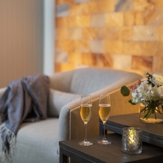 spa waiting room with glasses of champagne