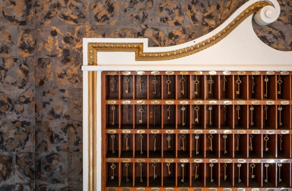 a wall of room keys at Hotel Viking