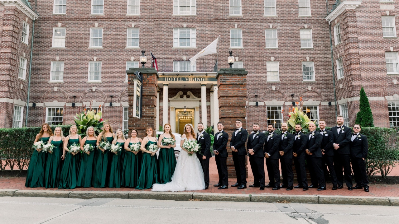 wedding party in front of hotel viking building