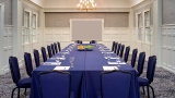 Image of a conference room with a large dining table.