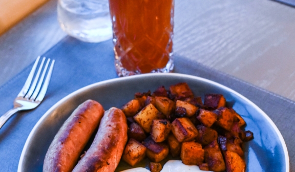 eggs, sausage, and hash brown breakfast