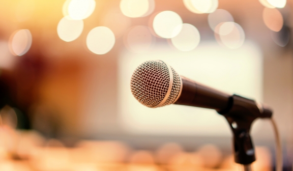Microphone in meeting room for a conference