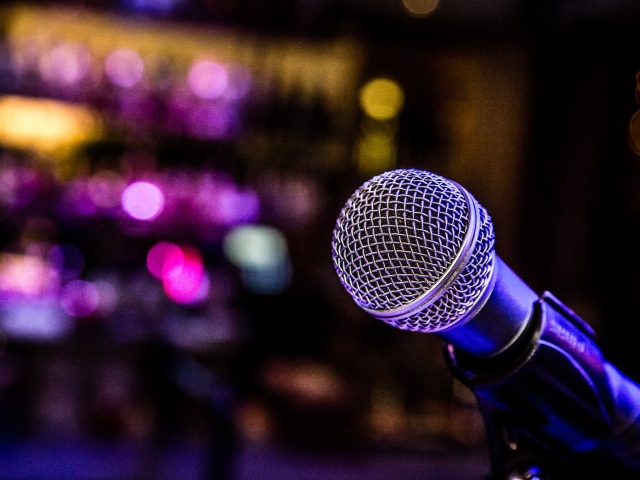 A microphone set up on stage at an event