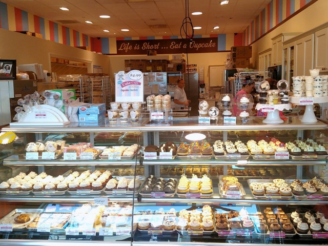 Counter filled with cupcakes at Cupcake Charlie's